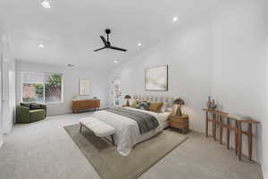 Bedroom with light carpet, ceiling fan, recessed lighting, and high vaulted ceiling