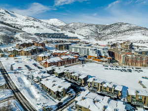 Snowy aerial view with a mountain view