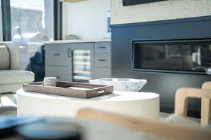 Living room featuring beverage cooler