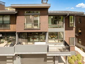 Back of house with a metal roof