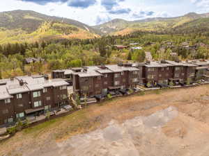 View of mountain backdrop with nearby suburban area