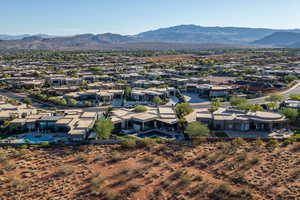 Aerial view of residential area with a mountainous background