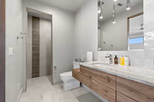 Bathroom featuring vanity and light tile patterned floors