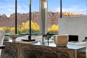Dining area featuring plenty of natural light and a mountain view