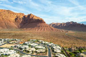 View of property location with nearby suburban area and a mountainous background