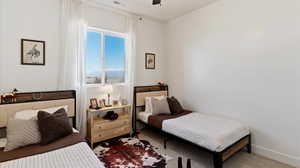 Bedroom featuring carpet flooring and baseboards