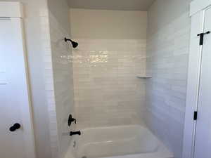 Bathroom with bathing tub / shower combination