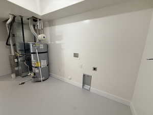 Utilities featuring strapped water heater and heating unit