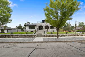 Front yard with all new Sprinkler, trees, s and landscaping.  All concrete is brand new including public sidewalks.  Park strip is xero-scaped.
