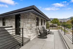 Amazing 2nd floor patio with gorgeus stone work and amazing Mountain and Valley views.