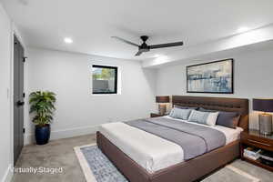 SE basement bedroom with furniture example.