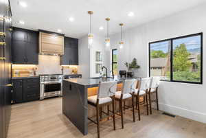 Kitchen featuring  extra large built in fridge and freezer with Cabinet style doors, and a separate Ice maker for entertaining.