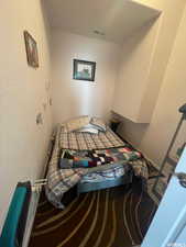 Bedroom with a textured wall