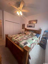 Bedroom featuring carpet floors, a closet, and a ceiling fan