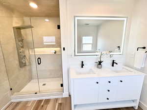 Double vanities and large shower
