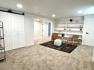 Downstairs family room with built-in shelving