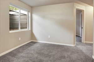Flexible open space in basement. Great for toy room, video/tv space