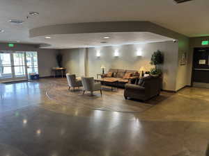 Lobby featuring a textured ceiling and recessed lighting