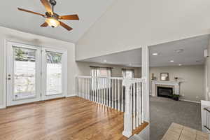 Dining area with hardwood floors, french doors, ceiling fan and new 3-tone paint