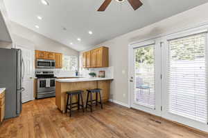 Vaulted Ceiling and hardwood floors.
