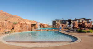 Community pool featuring a patio area