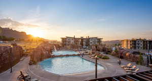 Community pool featuring a patio area and a mountain view