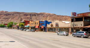 View of commercial property with a mountain view