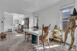 Dining area with wood finished floors