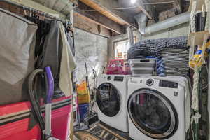 Laundry area featuring independent washer and dryer
