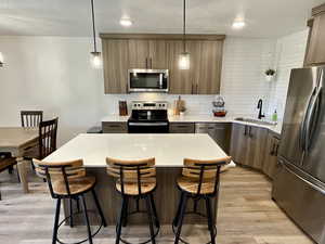 Quartz counter tops and all major kitchen appliances area included