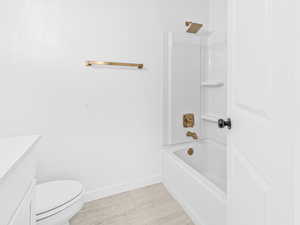 Bathroom featuring vanity and bathing tub / shower combination
