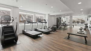 Brand new fitness area featuring recessed lighting, plenty of natural light, mountain views