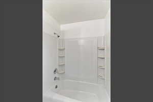 Bathroom with shower / bathtub combination