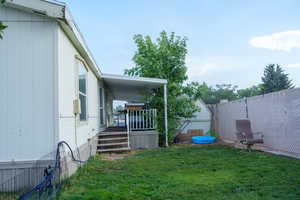 View of fenced backyard