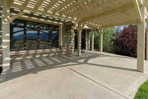View of patio / terrace featuring a pergola and french doors