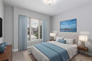Bedroom with baseboards and carpet floors