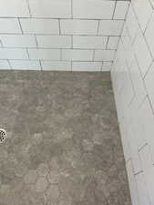 Bathroom view of tiled shower