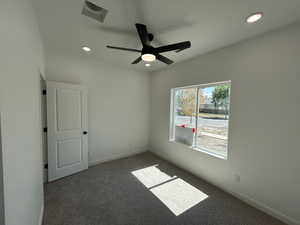 Unfurnished room featuring carpet flooring, recessed lighting, and a ceiling fan