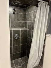 Full bathroom with a stall shower