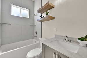 Full bath with shower / bath combination and vanity