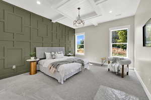 Carpeted bedroom featuring beamed ceiling, a chandelier, and recessed lighting