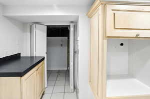 Bathroom featuring light tile patterned flooring