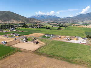 View of mountain background featuring rural landscape