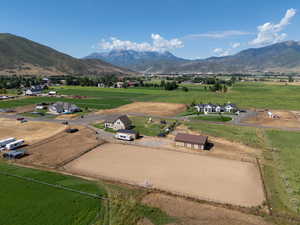 View of mountain backdrop featuring rural landscape