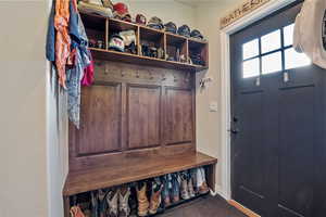 Mudroom featuring baseboards