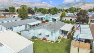 Aerial view of residential area with a mountainous background