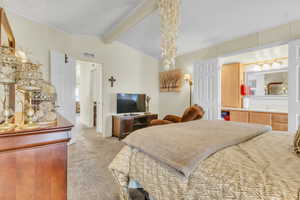 Bedroom with light colored carpet