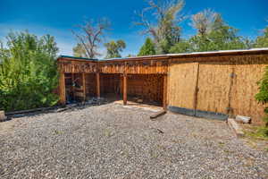 View of yard with an outbuilding