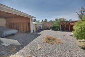 View of yard featuring an outdoor structure