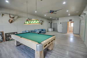 Rec room featuring billiards, light wood-style floors, recessed lighting, and a ceiling fan